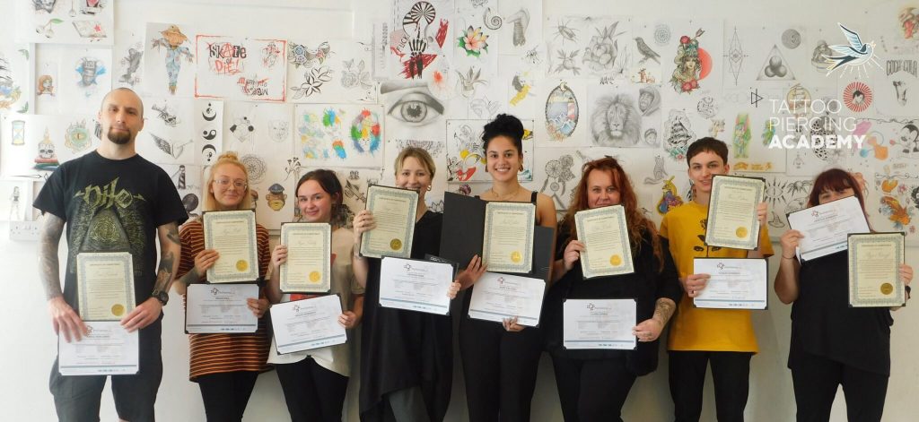 Tattoo Piercing Academy Students with Certificates on tattoo courses